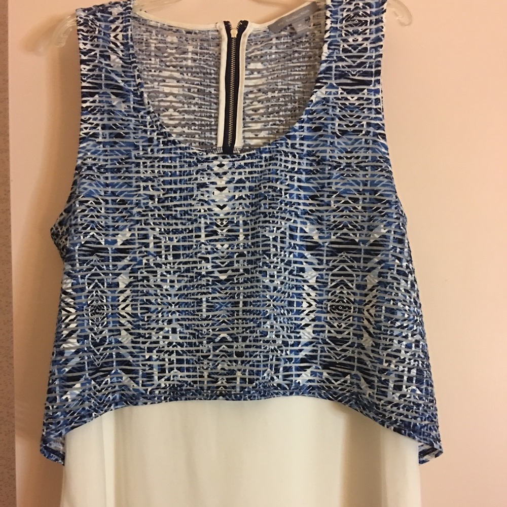 Sleeveless two-material blouse